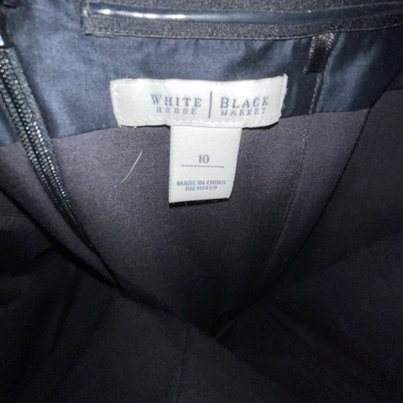 Beautiful black and white mini Dress. It’s a size 10 but fits mire like an 8 - Picture 2 of 2